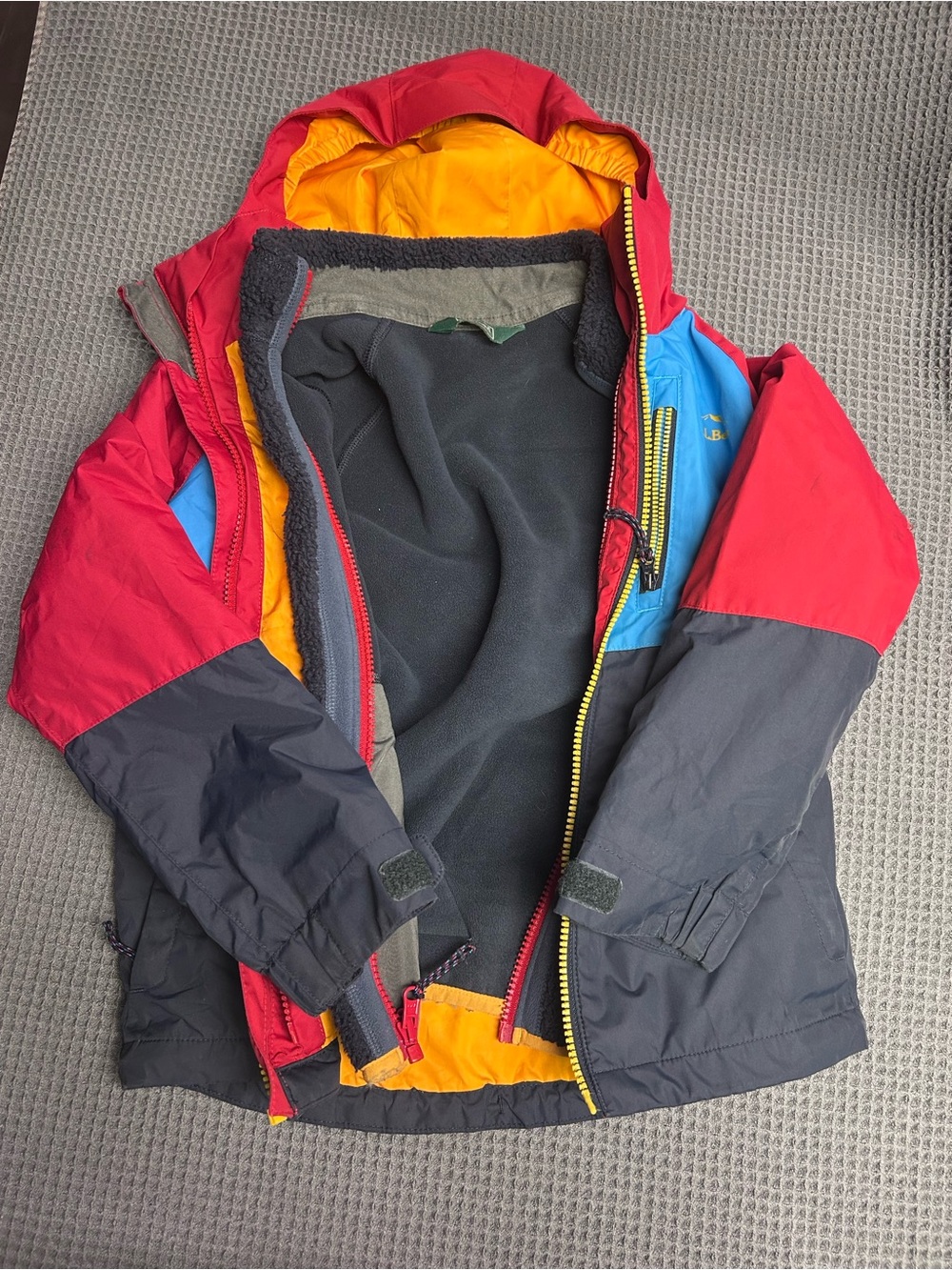 L.L. Bean Kids Colorblock Puffer Jacket in Red, Blue & Black with Yellow Lining